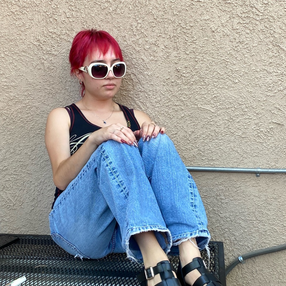 Cream colored maximalist sunglasses